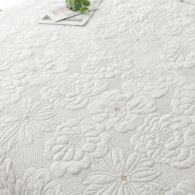 white embroidered quilt set